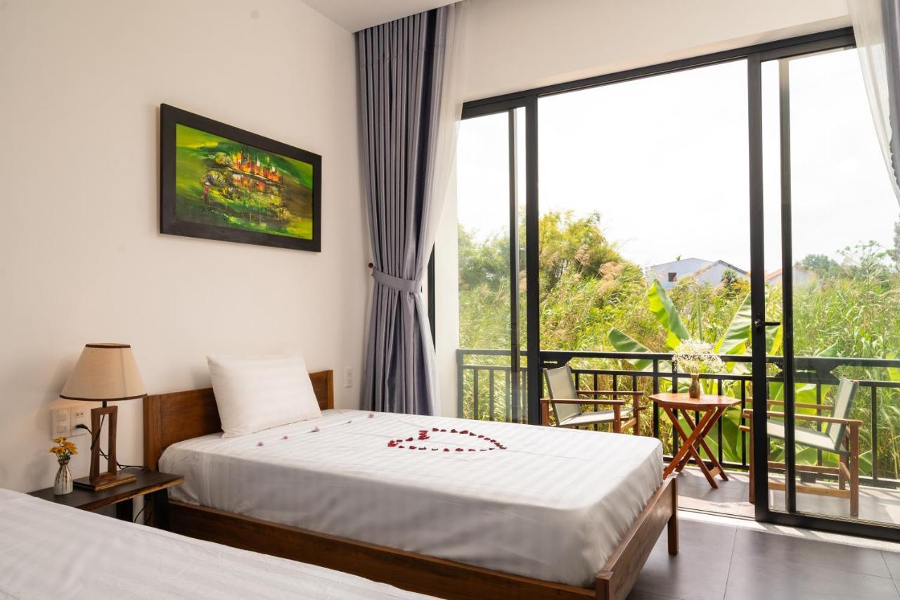 The Boathouse Riverside Homestay Хойан Экстерьер фото