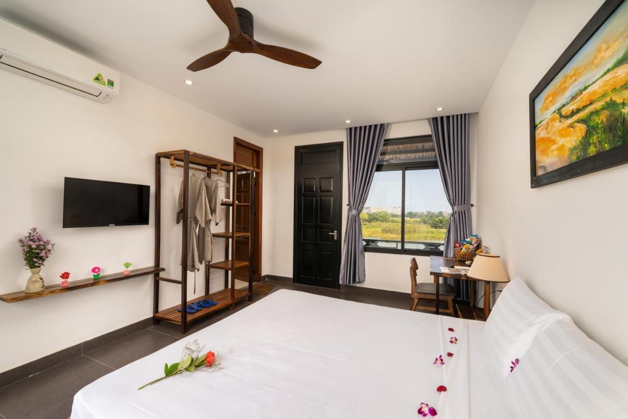 The Boathouse Riverside Homestay Хойан Экстерьер фото