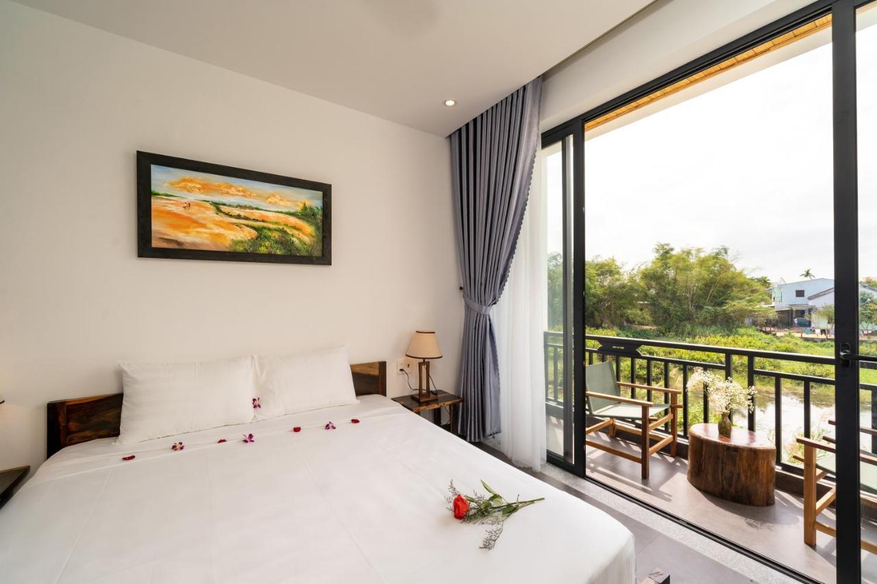 The Boathouse Riverside Homestay Хойан Экстерьер фото