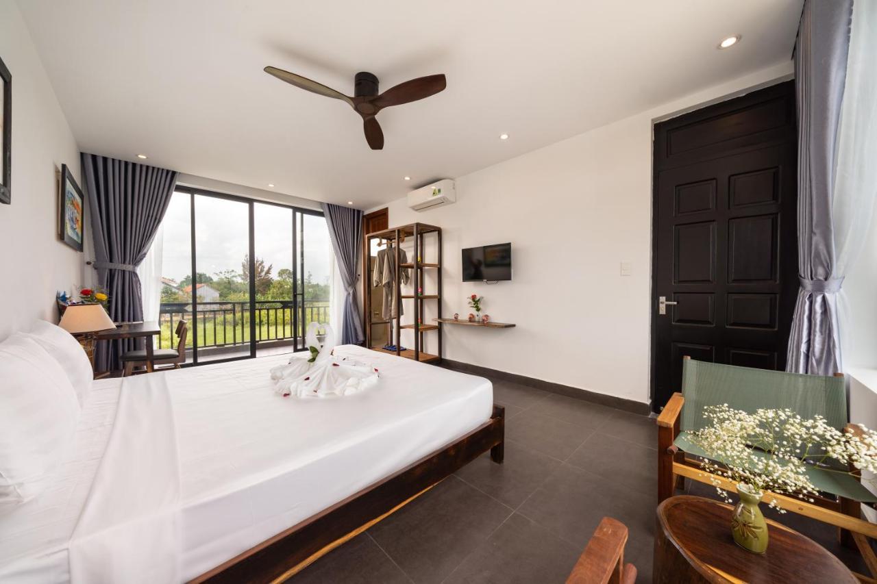 The Boathouse Riverside Homestay Хойан Экстерьер фото